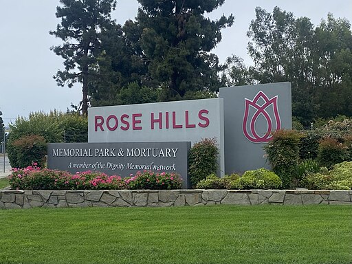 512px Rose Hills Memorial Park Mortuary entrance sign